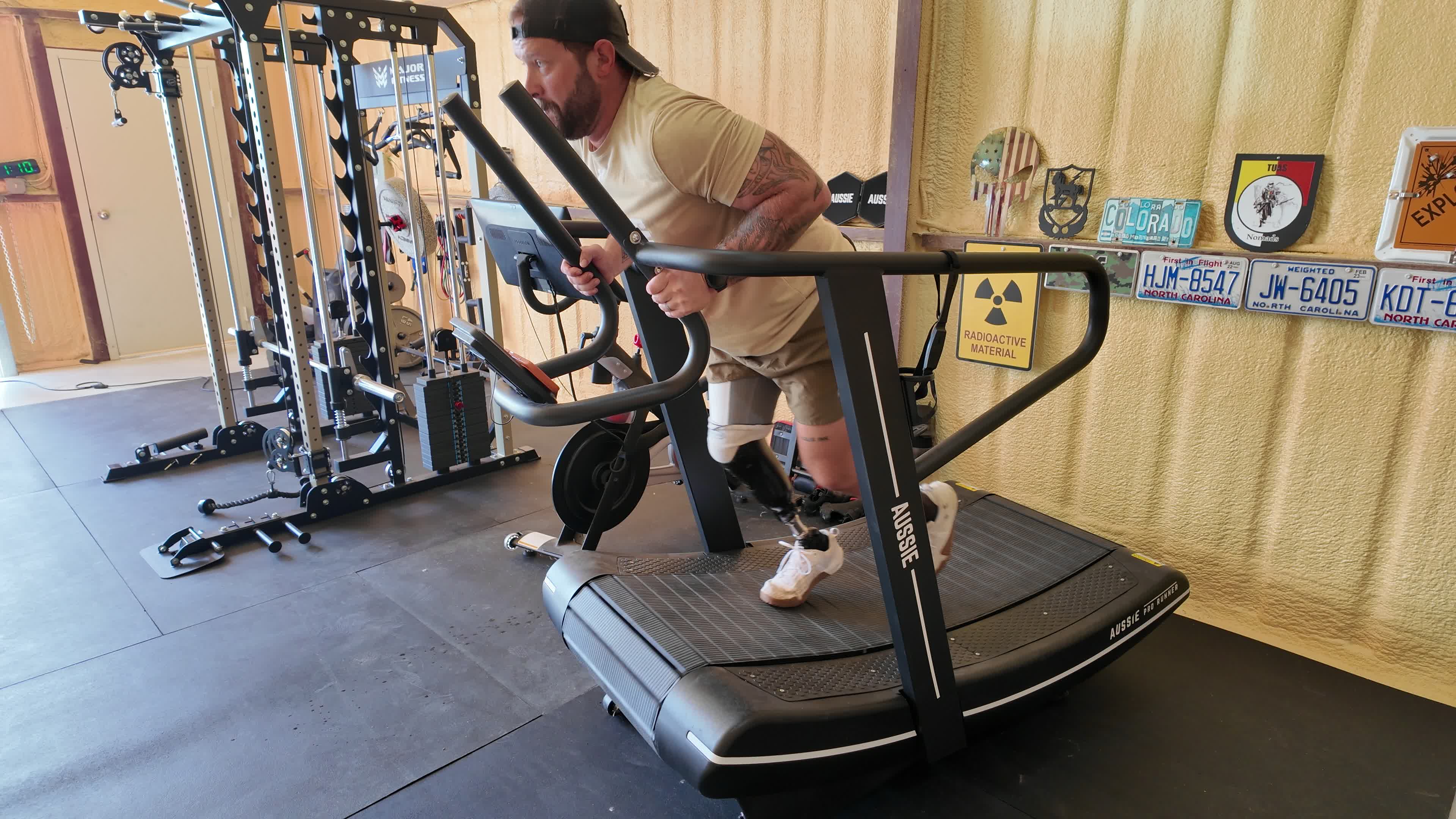 Andrew May using sled resistance on the Aussie Pro Runner in his home gym